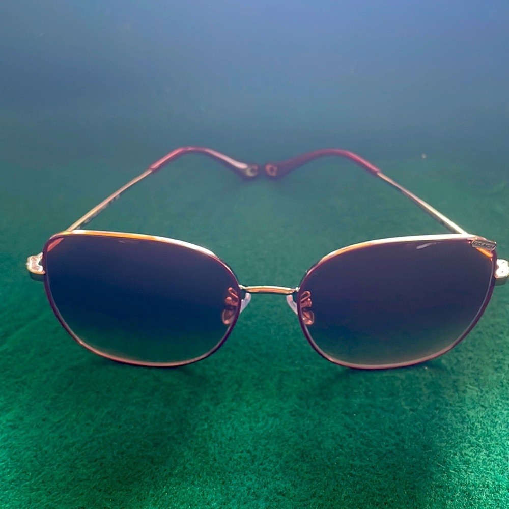 Coach sunglasses. Never been worn.